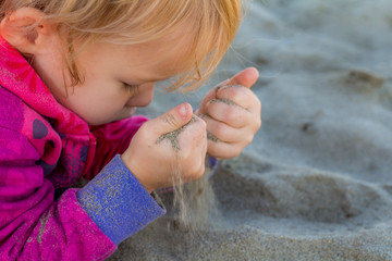 kid loving the beach