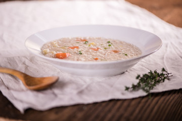 close up of a healthy taste barley soup with root vegetables