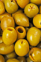 Olives. Green fresh olive textute pattern closeup photo as background. Olives backdrop closeup photo.