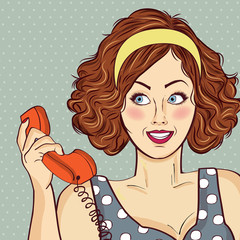 beautiful red-haired lady, speaks to a retro phone
