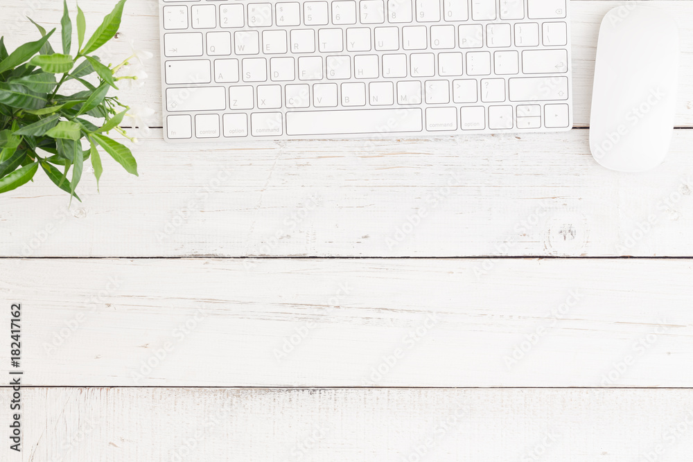 Wall mural flat lay photo of office desk with mouse and keyboard on white table wood,copy space and top view