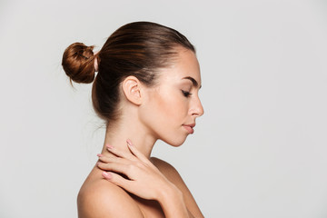 Side view beauty portrait of a beautiful half naked woman © Drobot Dean