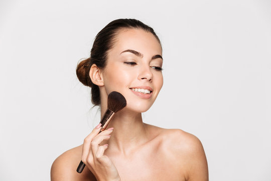 Beauty portrait of a happy beautiful half naked woman