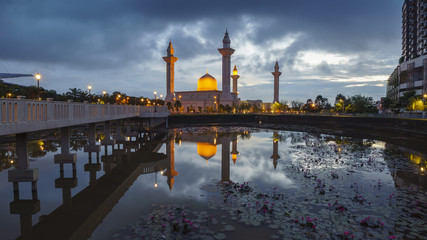 Beautiful scene of sunrise with reflection of Masjid Tengku Ampuan Jemaah, Bukit Jelutong, Shah Alam