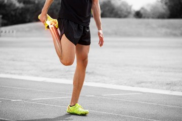 Highlighted bones of athlete man stretching on race track