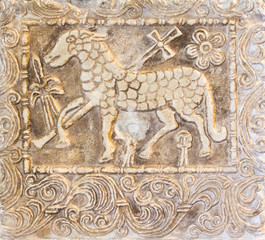 Pavia. Italy. November 11 2017. Craving in stone of "Lamb of God" (Angus Dei) from IX century. Castello Visconteo (Visconteo Castle) in Pavia.