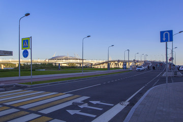 Pedestrian road with a painted zebra, pedestrian crossing on the Yacht Bridge, new stadium 