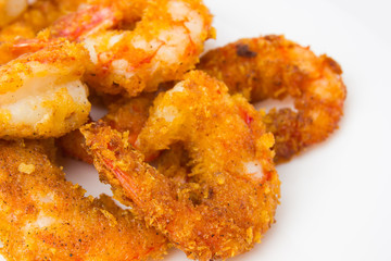 Fried prawns on a white background. Prawns fried in breading close-up.