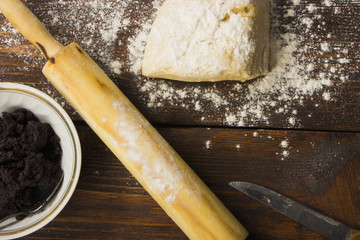 dough with close-up. man is preparing bread dough