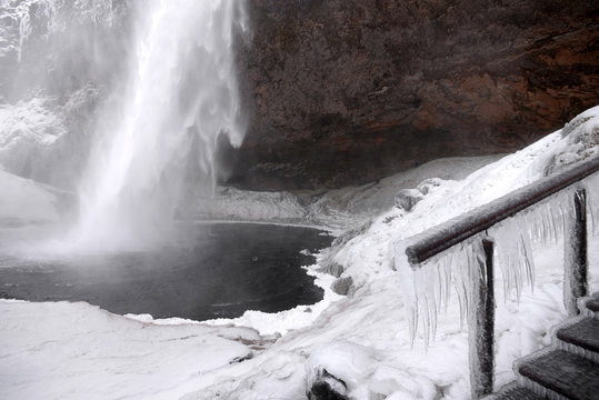 Ice at Seljalandsfoss waterfall on the ringroad, Iceland in winter, Iceland