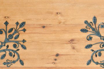 Wooden door with wrought metal elements