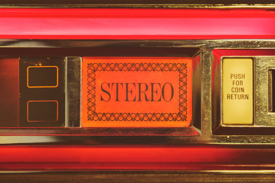 Close up of a vintage jukebox with the text stereo