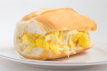 Bread with scrambled egg. Brazilian Pao com ovo
