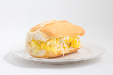 Bread with scrambled egg. Brazilian Pao com ovo