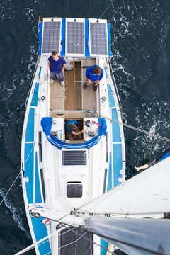 Three men in sailboat, Istria, Pula, Croatia