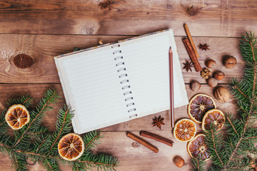 Christmas cookies, spices and recipe book. Food background. Vintage style picture