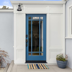 Glass Entry Door. Front door in Lively Blue with framed glass and electronic lock entry.