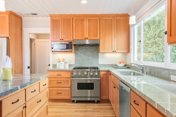  Custom designed wooden kitchen with gorgeous granite counter tops and kitchen island