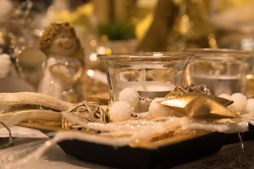 Christmas theme with candle, star and angel on the background