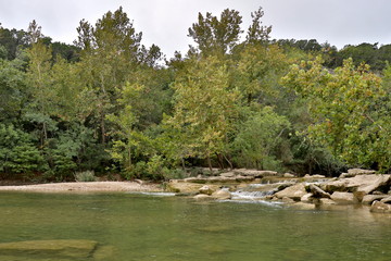 Clouds rolling in over water