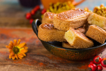 Autumn dessert, stuffed cookies on the wooden table, Thanksgiving food concept