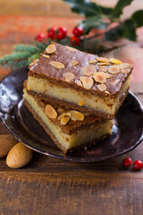 Almond stuffed Christmas cookies on Christmas decorated table