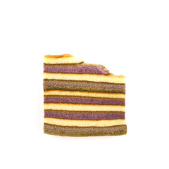 Bite stripe butter cake sponge isolated on white background. Vertical zebra or marble cake. Top view. Close up. Eating sequence for GIF animation.