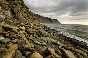 The beautiful rocky beach of Utrish at sunset.
