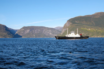 Boat or ferry in Sognefjord scenery, Norway, Scandinavia