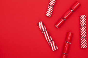 Christmas crackers on a red background