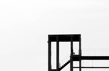 silhouette of a concrete tower in the factory