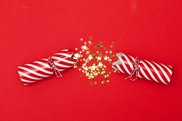Christmas crackers on a red background