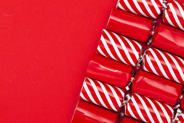Christmas crackers on a red background
