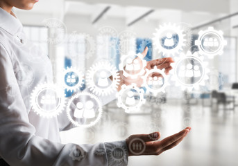 Cogwheels and gears mechanism as social communication concept