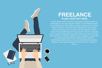 Freelancer working at home with laptop, top view. Concept of remote working or working at home. Outsourced employee, developer or web designer