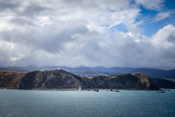 Lighthouse on cliffs near Wellington, New Zealand © daboost