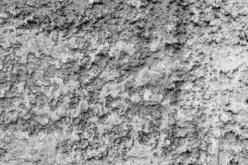 Wall fragment with scratches and cracks