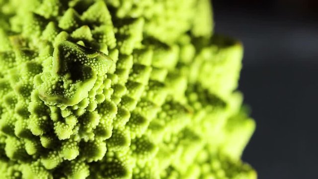 Romanesco broccoli or Roman cauliflower, close up shot, texture detail of the healthy vegetable. Macro.
