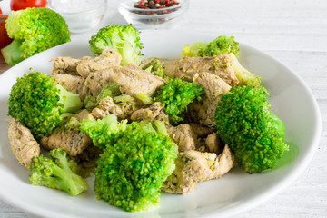 chicken fillet with broccoli in a plate