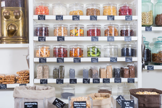Image of showcase with dried fruits in containers