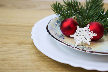 Festive table with Christmas decorations. Close-up.