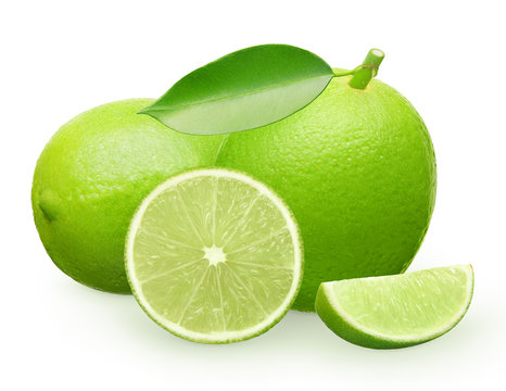Whole fresh lime fruit with green, lying, half and slice