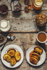 pancakes with syrup on a white plate - serving cozy