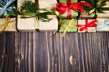 Christmas gift boxes on wooden table with copy space