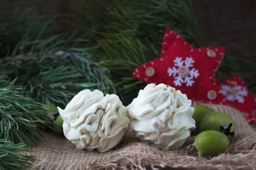 Winter feijoa tasted zephyr or marsmallows on the wooden background