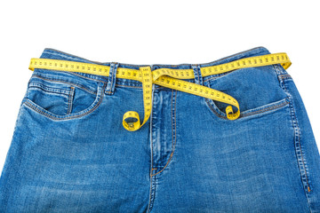 jeans and centimeter on a white background