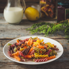 multicolored fusilia pasta (spiral) food background