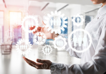 Cogwheels and gears mechanism as social communication concept