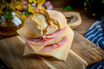 Sandwich with cheese and ground ham.
