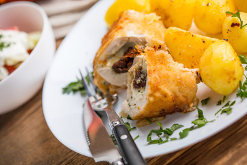 Chicken breast stuffed with cheese and dried tomatoes.
